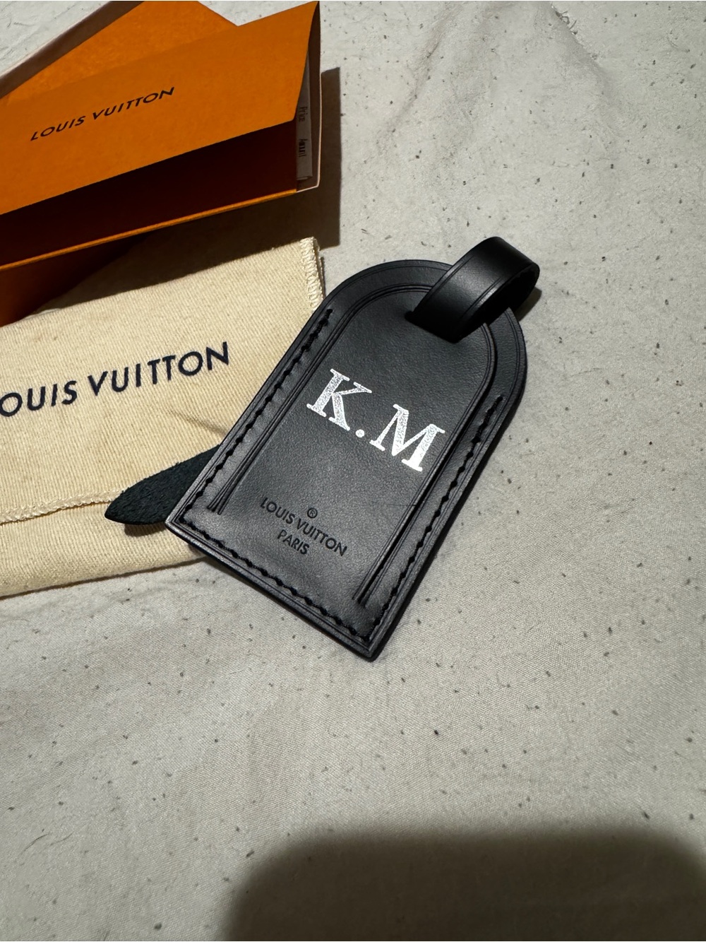 Louis Vuitton Black Leather Monogrammed Luggage Tag “KM”. Never used. New in box